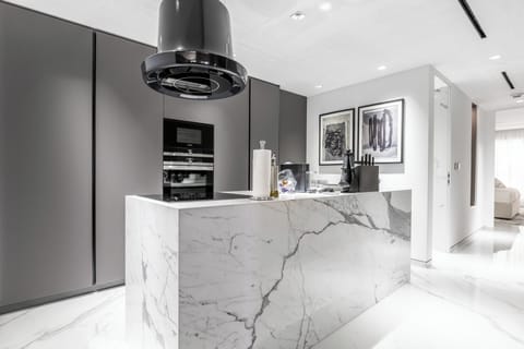 Luxury Apartment, Sea View | Private kitchen | Electric kettle, toaster, highchair