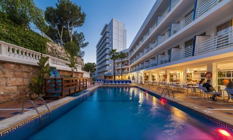 Outdoor pool, a rooftop pool, pool umbrellas
