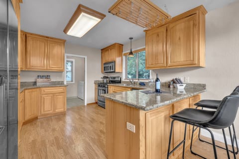 Breakfast Bar in Kitchen Area with two Bar Seats.