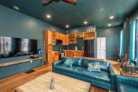 Curl up in the chic living room & stream your favorites on the smart TV