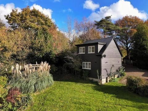 The Nest rear elevation with wonderful views to the woods. Detached and private.