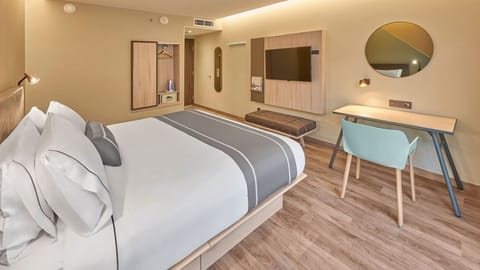 Settle in comfortably with a dedicated workspace and large TV.