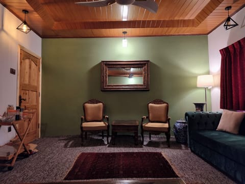 Spacious living room with traditional charm and modern comfort.