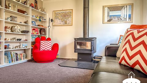 Lounge with wood heater upstairs