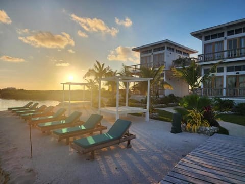 Unwind at golden hour as the sun melts into water.