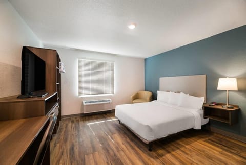 Unwind in crisp linens with TV and easy comfort.