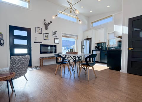 Sun-drenched open layout featuring sleek modern design—your stylish home base for a Sheridan getaway