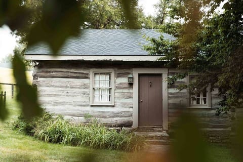 Front of Cabin.  This home offers the feel of being taken back into history, but yet is located in the courtyard / center portion of the farm.