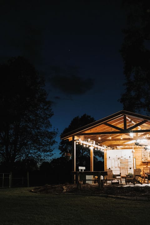 Mockingbird Gazebo provides guest with a private backyard experience, firepit.
