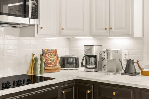 Thoughtfully stocked coffee and tea station with drip coffee maker, tea kettle, and toaster—everything you need for slow mornings in the mountains. (French press also available, not pictured.)