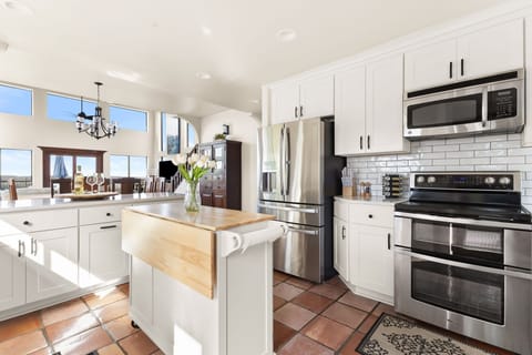 Chef's kitchen with stainless steel appliances

