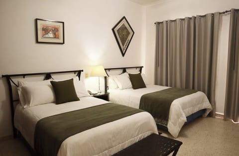 Standard Double Room, Courtyard View | In-room safe, laptop workspace, blackout drapes, free WiFi