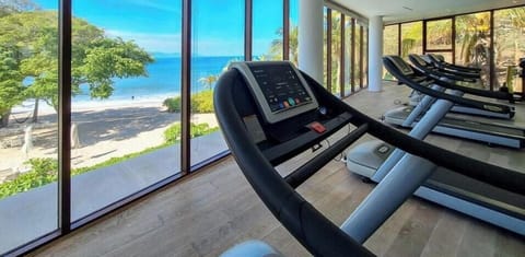 Stay active with premium fitness equipment while enjoying breathtaking views of the beach and ocean.