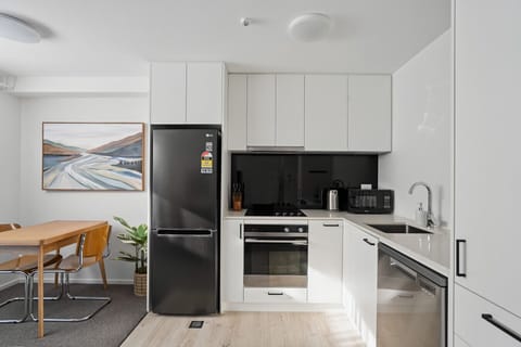 Kitchenette: Modern amenities and vibrant decor invite culinary creativity!