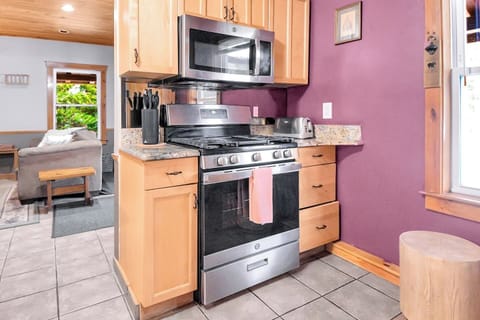 Cook your favorite meals in this fully equipped kitchen with modern appliances.