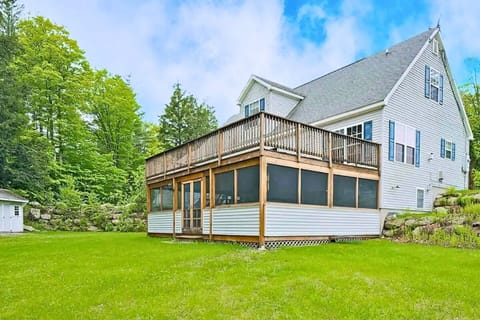 Enclosed porch with a nice hot tub or a big deck for the whole family to hang out on for a cook out this home can fit everyone! 