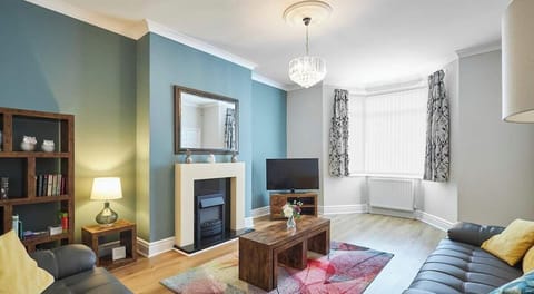 Relax in this spacious living room designed for comfort and style.