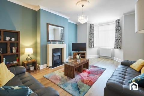 Relax in this spacious living room designed for comfort and style.