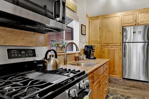 The full kitchen is equipped with basic necessities, making it easy to prepare meals during your stay.