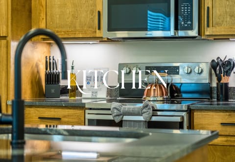 Fully stocked kitchen with everything you need to whip up meals or just heat up takeout in style.