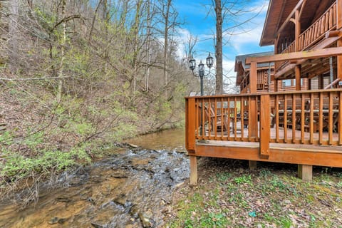Escape to Creekside Dreams!  Unwind on the back deck, just steps from the creek!