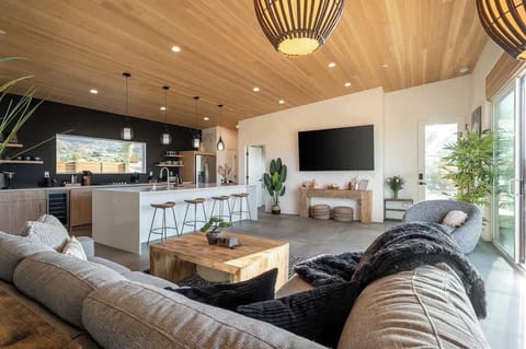 Living room with a 85" 4K Smart TV and stunning views on either side