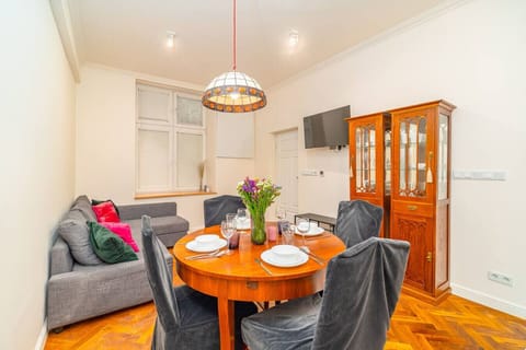 Living Room with Sofa Bed, Smart TV and Dining Table | Book Now with RENTUJEMY.COM