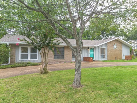 Beautiful beach home with circular drive for ample parking.