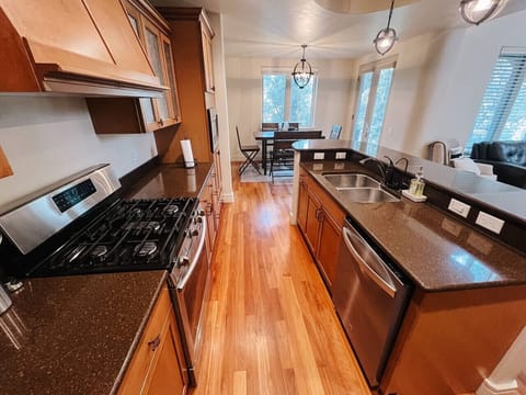 Open Kitchen with Stainless Steel Appliances