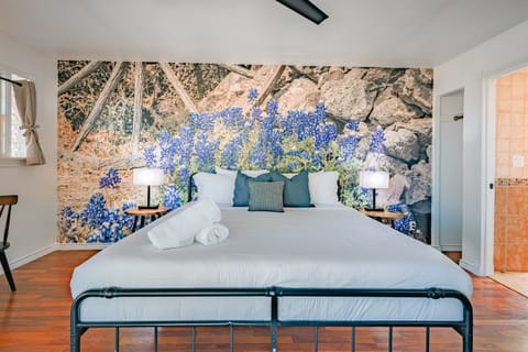 Thoughtfully furnished bedroom featuring a luxurious king bed