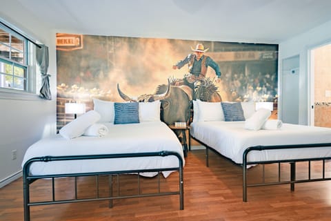 Unwind in a beautifully arranged sleeping area, featuring plush double-sized beds for restful nights.