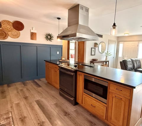 Everything you need to prepare meals is here in the kitchen! Featuring a gas stove, oven, microwave, dishwasher, refrigerator, freezer, crockpot, blender, a toaster, and more. You’ll also find plenty of cupboard space to store groceries. 