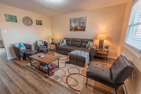 A bright and inviting living area designed for comfort and seamless gatherings.