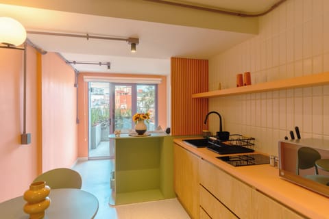 Executive Studio Suite, Garden View | Private kitchen | Shared fridge, microwave