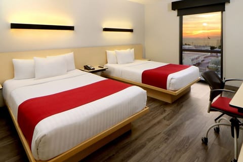 Drift off as sunset colors glow through your window.