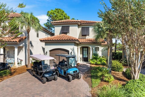 "Baytowne Boardwalk 2" with 6 & 4 seat golf cart.