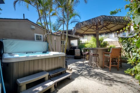 Your own private outdoor patio with hot tub and dining