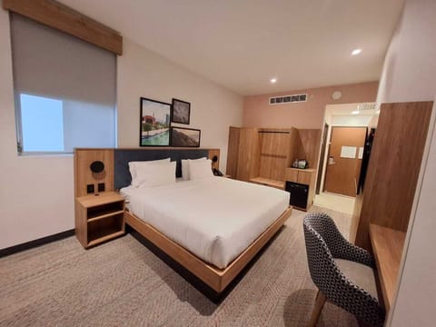 In-room safe, desk, laptop workspace, iron/ironing board