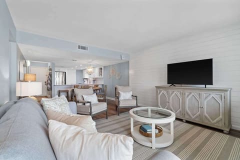 Sit back, relax and take in the ocean views from inside the cozy living room.