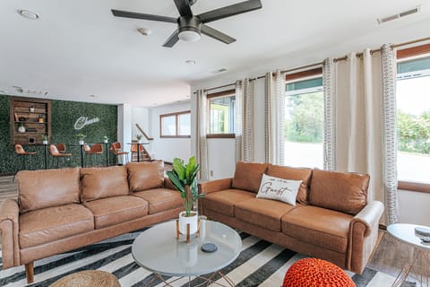 Experience warmth and camaraderie in this stylish common space, ideal for unwinding with friends.