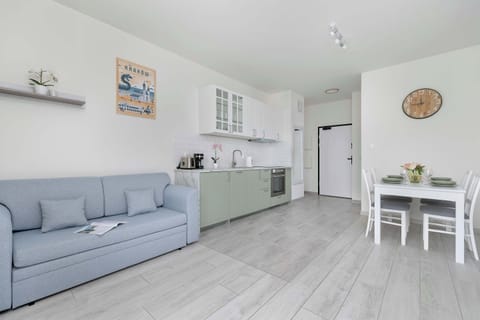 The living room's modern and stylish decor creates a welcoming atmosphere.