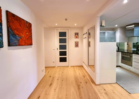 Luxury Apartment | Living area | 50-inch Smart TV with digital channels, streaming services