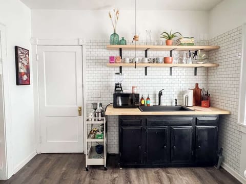 The kitchen is pretty small, they didn’t have many appliances 100 years ago