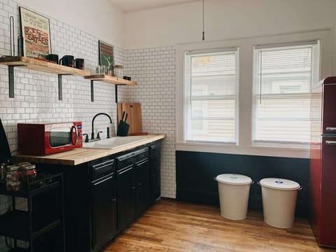 Butcher block countertops. Local coffee and Tea. Basics are stocked in the pantry. Retro feel appliances. 