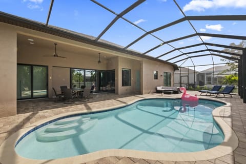 Heated pool with enclosed screen