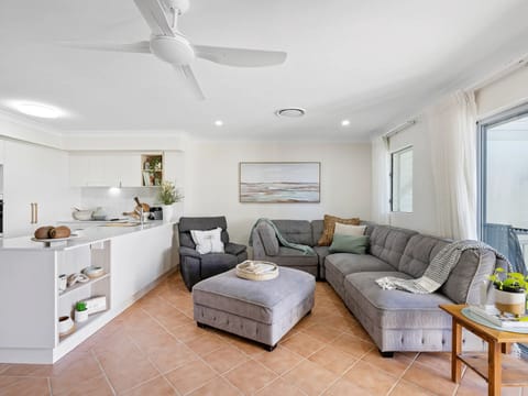 Bright and comfy open-plan living area.