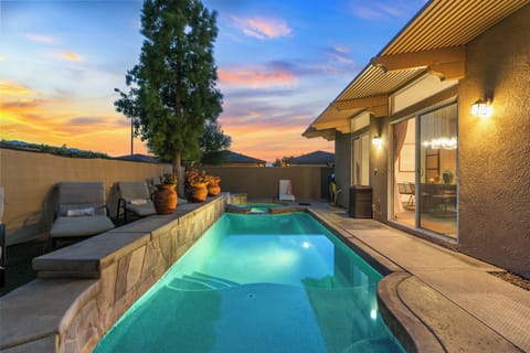 Dive into relaxation in your private backyard oasis with a pool and hot tub!