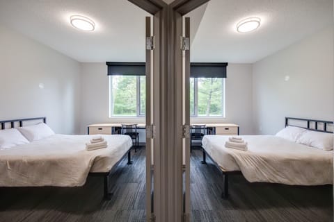 Standard Room, 2 Double Beds | 2 bedrooms, desk, laptop workspace, blackout drapes