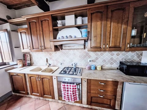 Kitchen, Countertop, Wood, Major Appliance, Cabinetry, Flooring, Kitchen Appliance, Furniture, Interior Design, Kitchen Sink