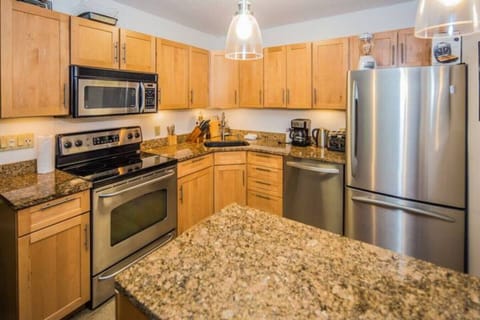 Left side - Stainless Steel & Granite kitchen.  If you like to cook, you are in the right place we have all of the pot`s, pans, baking sheet, muffin tins, cake pans, roasting pans you`ll need.  We also have loads of dry spices too.